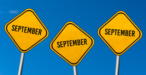 September - yellow sign with blue sky