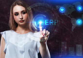 The concept of business, technology, the Internet and the network. A young entrepreneur working on a virtual screen of the future and sees the inscription: ERP