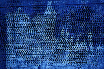 Grunge Torn poster after vote on tin textured wall. Ripped newspaper