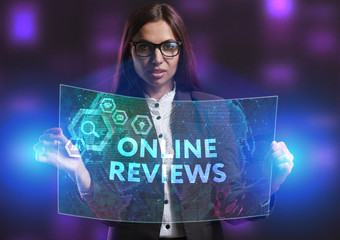 The concept of business, technology, the Internet and the network. A young entrepreneur working on a virtual screen of the future and sees the inscription: Online reviews