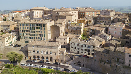 Fototapeta premium Aerial view of the municipality of Osimo, in the province of Ancona, in the Marche region, in Italy. The historic center, located on the highest hill of the city, called Gòmero, is a mountain tourist.