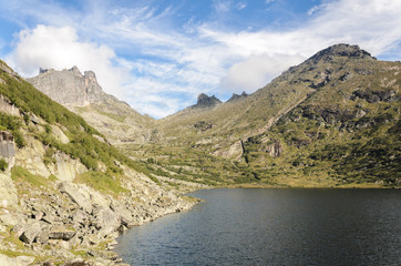 Fototapeta na wymiar Daylight landscape, view on mountains and lake, Ergaki