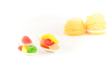 a pile of candies on a white background