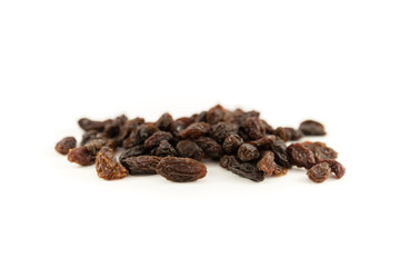 Dried raisins on a white background