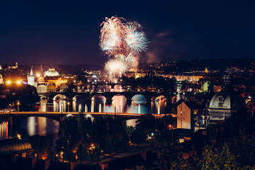 Night view of beautiful Prague bridges from the hill. Celebration with Fireworks over the river