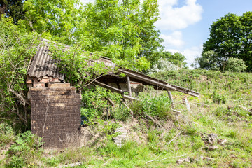 Forgotten old buildings, that are way past there best..On a sunny day.