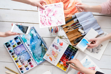 Naklejka premium art painting practice. watercolor drawings and ink dye mixes. creative painters lifestyle.