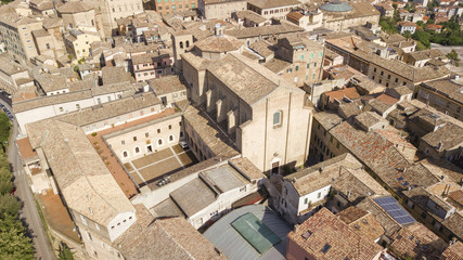 Fototapeta premium Aerial view of the municipality of Osimo, in the province of Ancona, in the Marche region, in Italy. The historic center, located on the highest hill of the city, called Gòmero, is a mountain tourist.