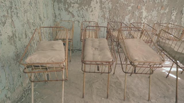 Neonatal ward in abandoned hospital of Pripyat. Chernobyl nuclear disaster. Slider shot - Juni 2017: 30km Chernobyl, exclusion zone