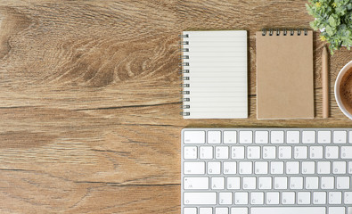 mock up white keyboard, notebook and cup of coffee