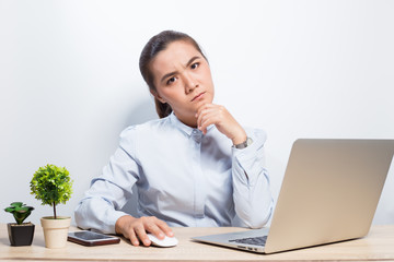 Woman look at laptop and she unhappy