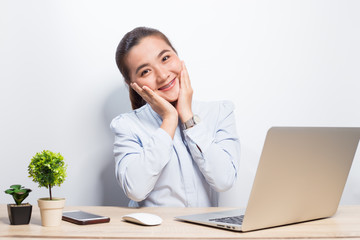 Happy woman at office