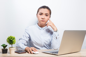 Woman look at laptop and she unhappy