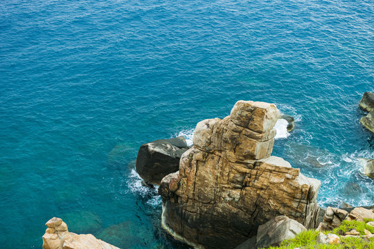 Pristine sea with rocky cliff at Dai Lanh cape point, Mui Dien, Phu Yen province, easternmost of Viet nam