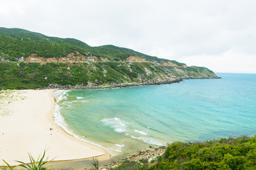 Fototapeta premium Beautiful Vietnam landscape, amazing and wonderful beach with mountain around, fresh air, nice view for Asian travel, ecology environment at sea area, Phu Yen have many scene for tourist at Viet Nam