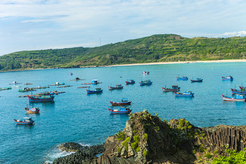 Obraz premium Seascape with volcanic rocks in Phu Yen, Vietnam