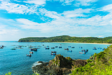 Fototapeta na wymiar Seascape with volcanic rocks in Phu Yen, Vietnam
