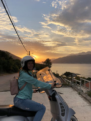 Girl on bike scooter in Montenegro