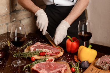the chef prepares Ribeye Steak