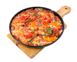 Stewed chickens with tomatoes and onions.