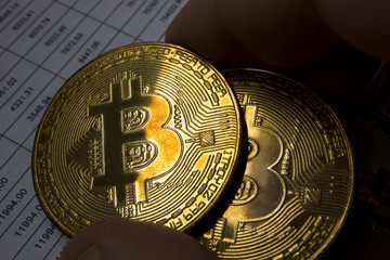 Fototapeta na wymiar bitcoin coin on mortgage documents