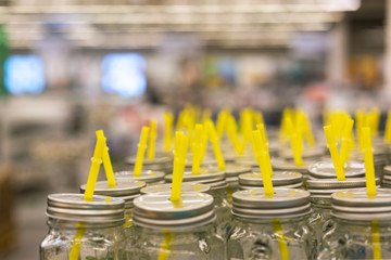 Glass jars with yellow tubules