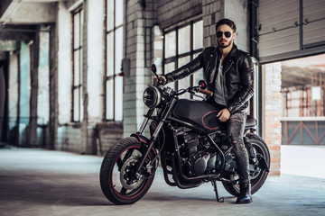 Obraz na płótnie Canvas Biker with modern motorcycle