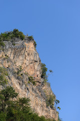 Extremely high mountain cliff for climbing.