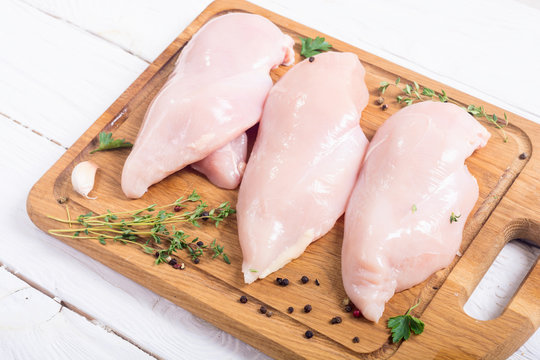 Raw chicken breast with spices