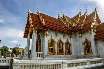 Wat Benchamabophit (The Marble Temple)Often referred to as the “marble temple” in guidebooks,...