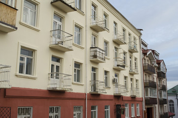 Naklejka premium building with balconies in the city