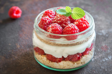 Raspberry cheesecake in  jar