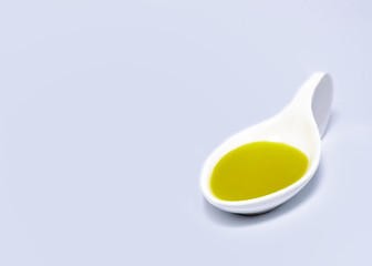 The spoon with virgin olive.