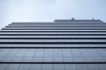 Obraz premium look up building windows big background