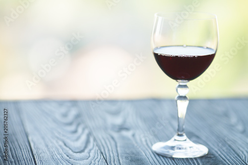 Wine Glass In Room Among Sunset Window Background Stock