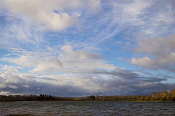 Fototapeta na wymiar Cloudy Cold Lake