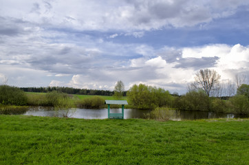 Obraz premium gazebo on the shore of the plant