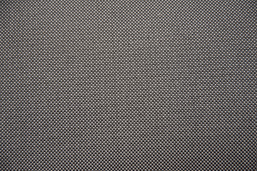 Dark gray fabric background. Horizontal