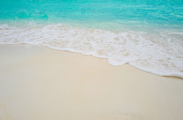 Fototapeta na wymiar Summer concept , Beach white sand and turquoise sea color at maldives on the weekend holidays