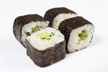 Sushi with avokado and cucumber on a white background close up.