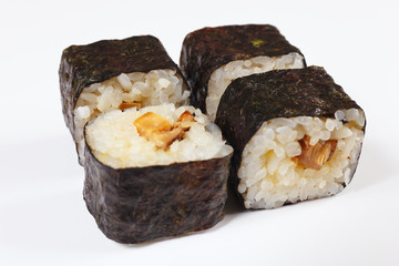 Sushi with eel and mushrooms on a white background close up.