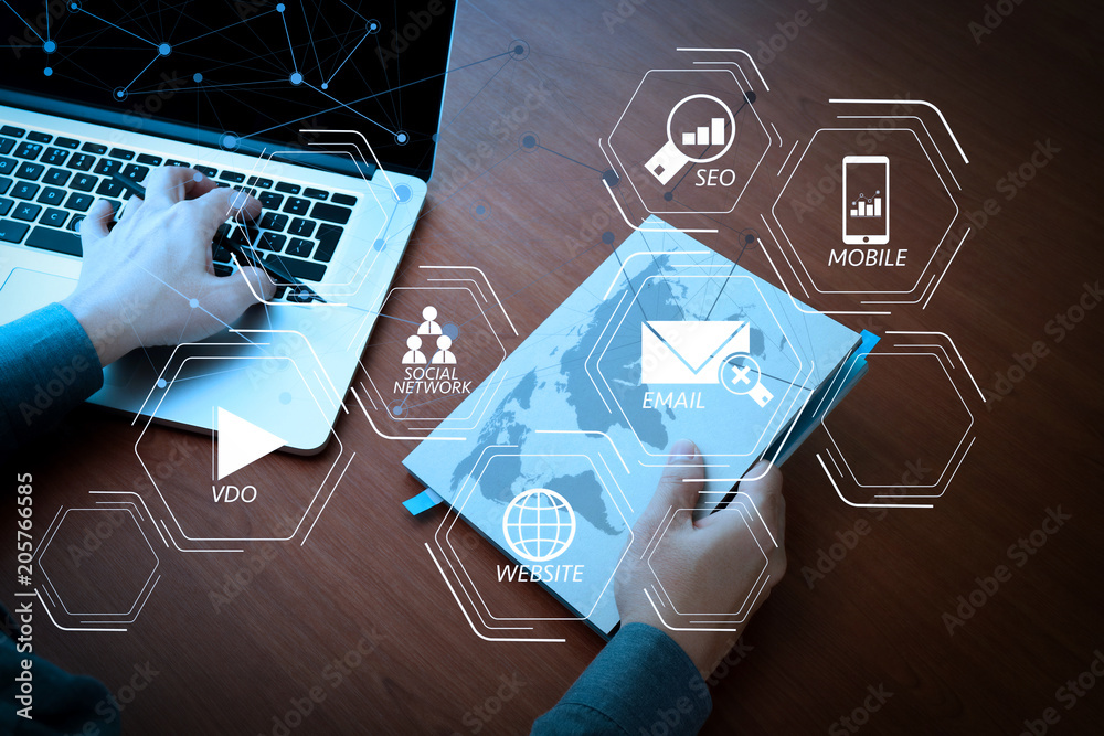 Poster top view of Double exposure of businessman hand working with new modern computer and business strategy as concept