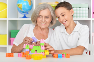 Grandson and grandmother playing