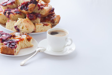 Delicious Homemade Cherry Pie. Fresh coffee cup with pie isolated on white background.