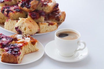 Delicious Homemade Cherry Pie. Fresh coffee cup with pie isolated on white background.