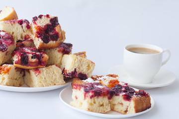 Fruit cake with cup of coffee. Homemade cake on breakfast.