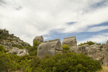 Fototapeta na wymiar Three Lycian tombs in Simena - Stock Image