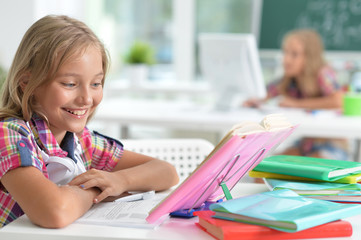 beautiful little girl at classroom