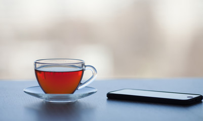 A cup of tea on the table with copy space