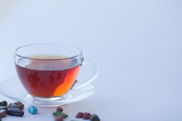 A Cup of freshly brewed black tea,escaping steam